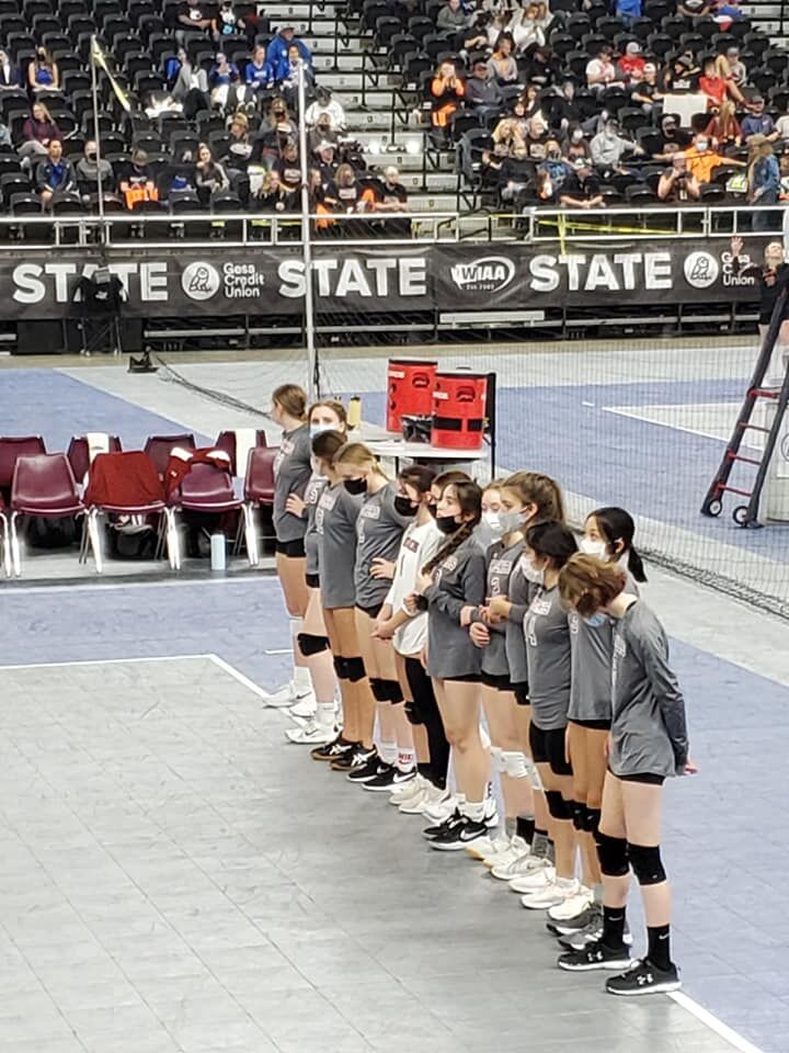 The volleyball team lines up